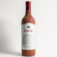 Thumbnail for DAOU Wine Bundle - DAOU bottle wrap on a wine bottle (view 8)