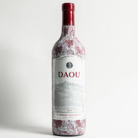 Thumbnail for DAOU Wine Bundle - DAOU bottle wrap on a wine bottle (view 5)