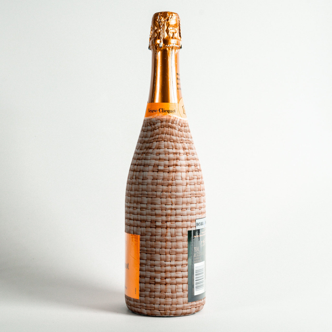 Honey Rattan Weave– Champagne Collection Bottle Wrap on Champagne Bottle