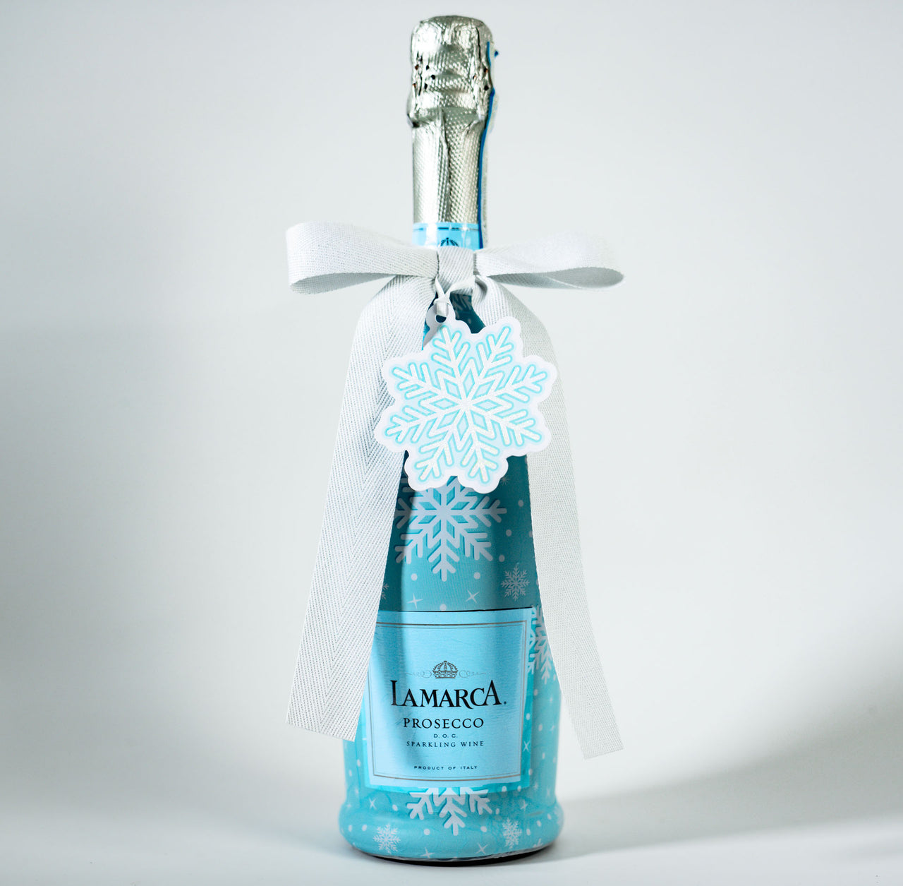 Wrapido Snowflake Bottle Wrap & Bow Matching Set on La Marca Prosecco