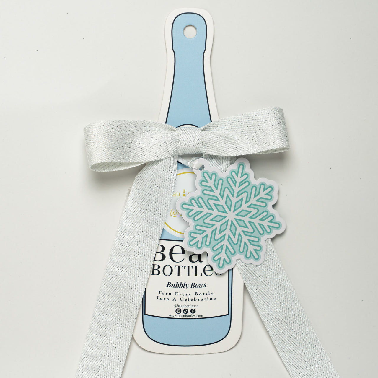 Wrapido Snowflake Bottle Wrap & Bow Matching Set on Champagne Bottle