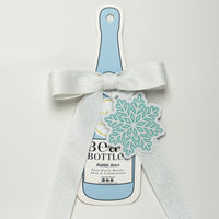 Thumbnail for Wrapido Snowflake Bottle Wrap & Bow Matching Set on Champagne Bottle