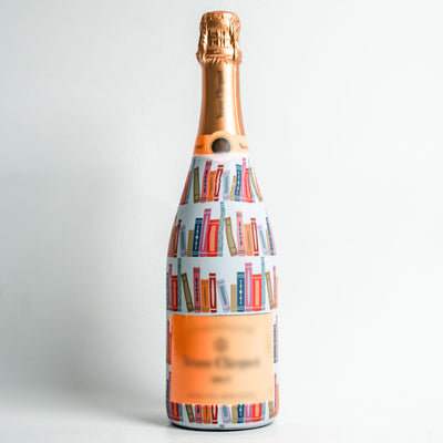 Warm & Bright Books Champagne Bottle Wrap bottle wrap on a Veuve Clicquot champagne bottle