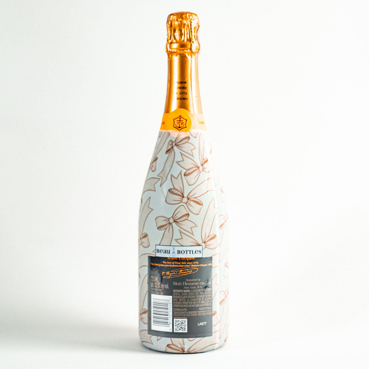 Beige Bows Bottle Wrap on Champagne Bottle