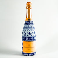 Thumbnail for Blue and White Knitted Ski Bottle Wrap on Champagne Bottle