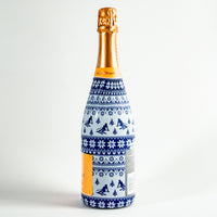 Thumbnail for Blue and White Knitted Ski Bottle Wrap on Champagne Bottle
