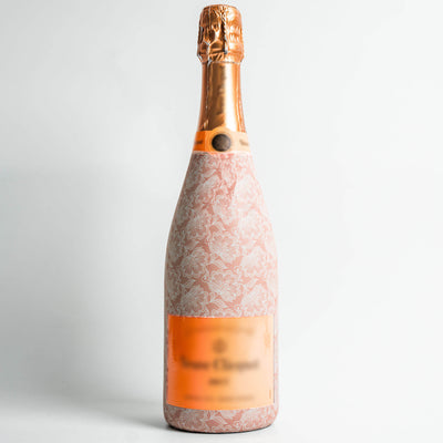 Blush Lace Floral Champagne Bottle Wrap bottle wrap on a Veuve Clicquot champagne bottle