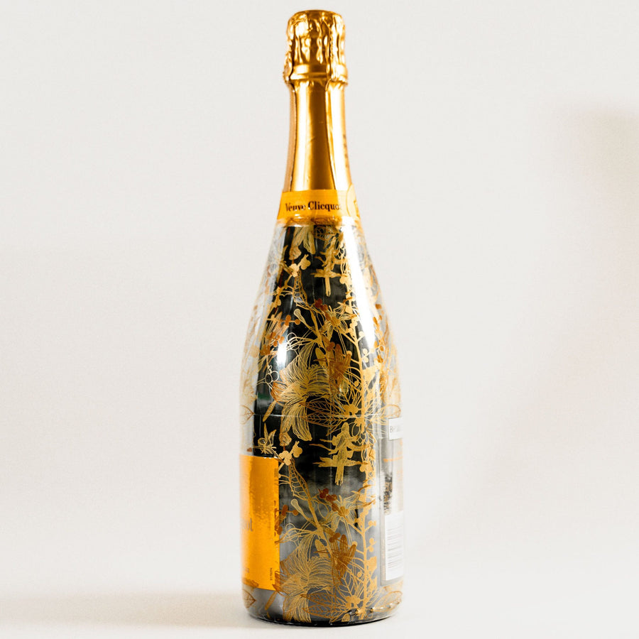 Clear Golden Botanical Bottle Wrap on Champagne Bottle