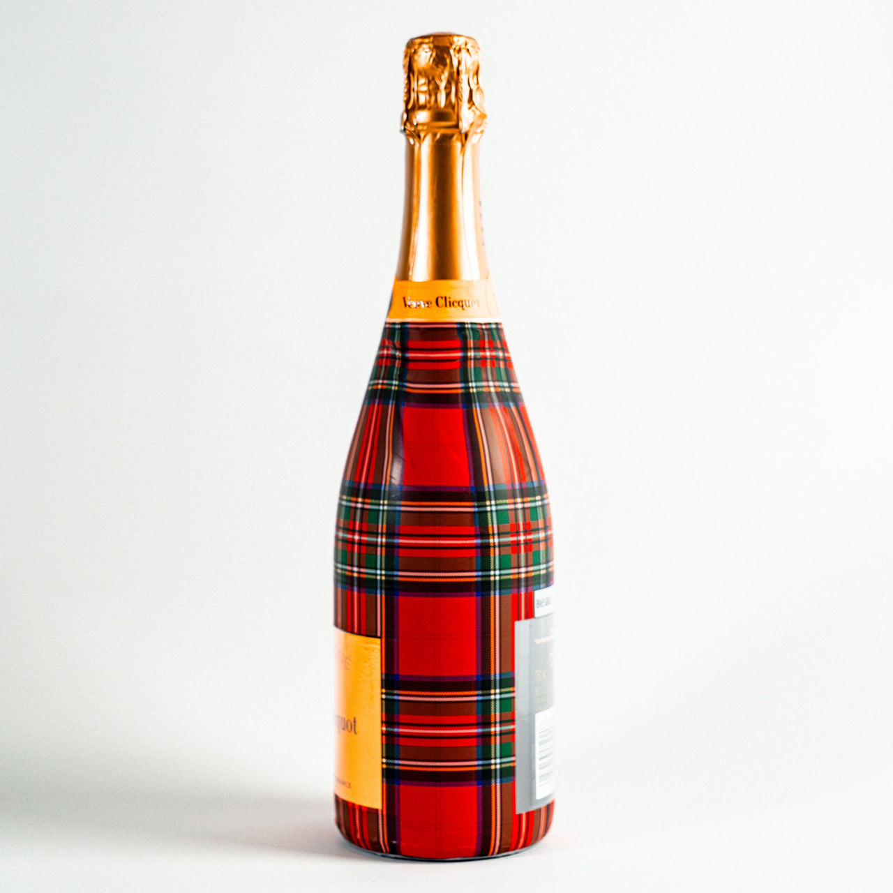 Red and Green Christmas Tartan Bottle Wrap on Champagne Bottle