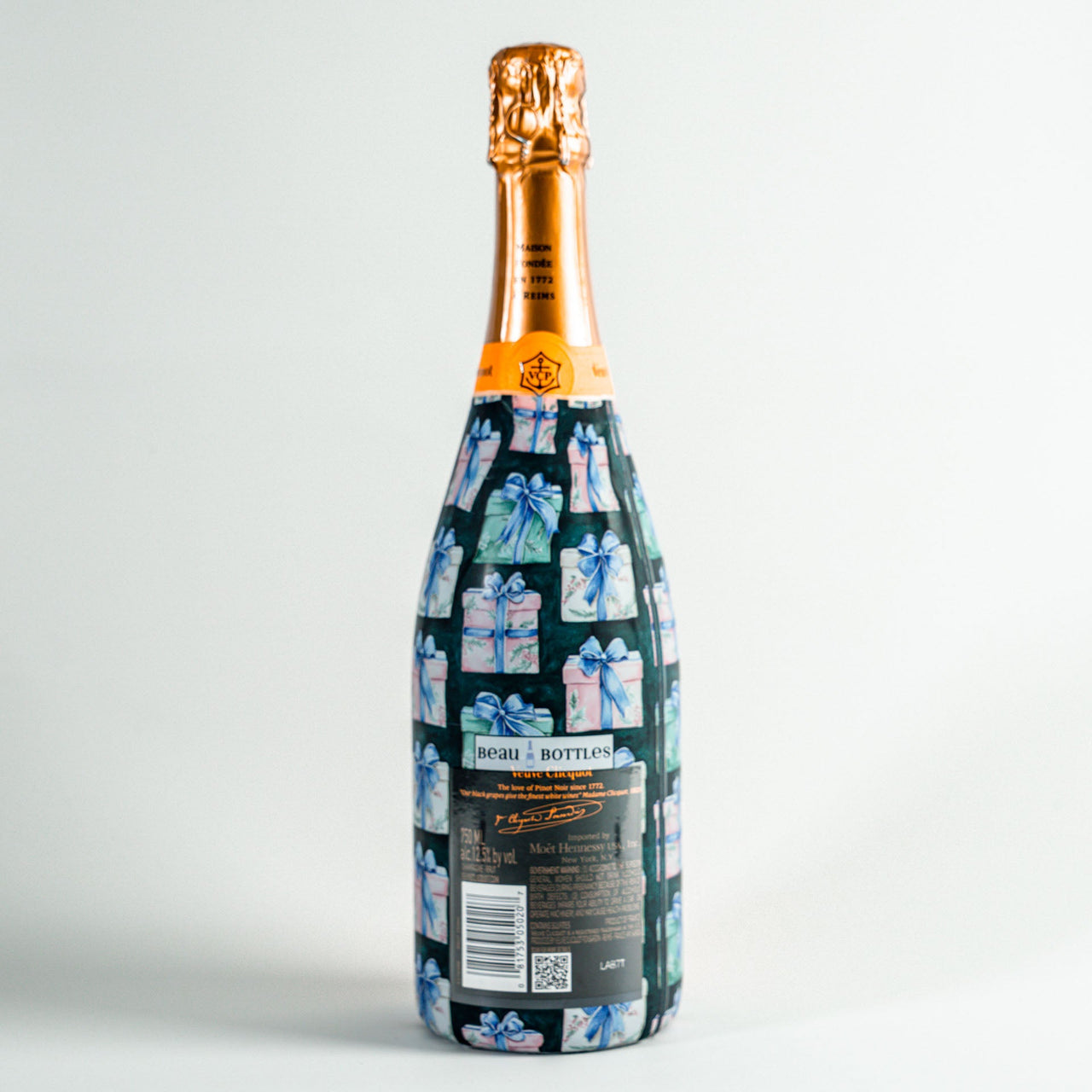 The Gift of Christmas Bottle Wrap on Champagne Bottle