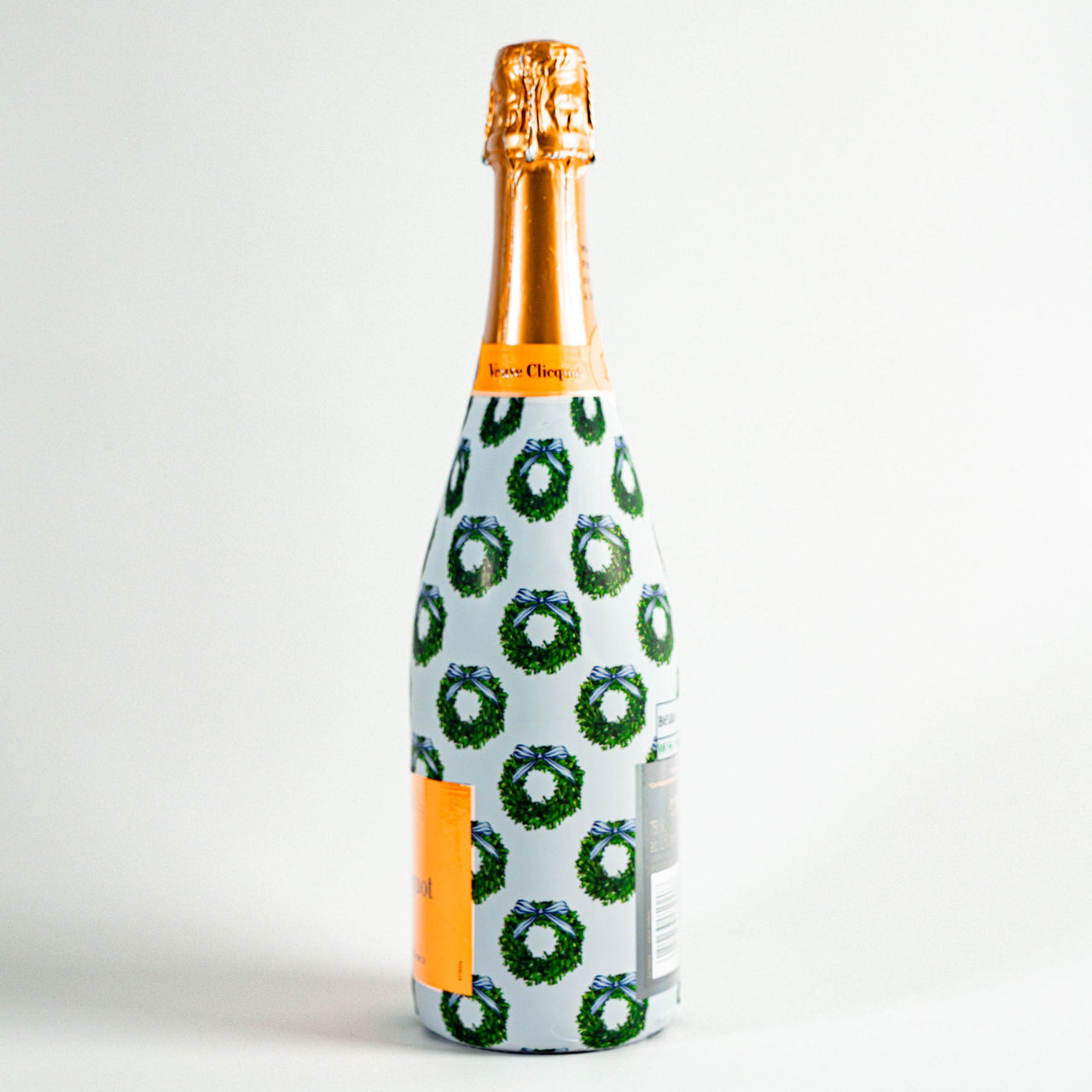 WH Hostess Boxwood Wreaths Bottle Wrap on Champagne Bottle