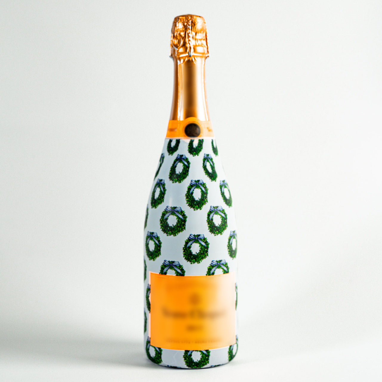 WH Hostess Boxwood Wreaths Bottle Wrap on Champagne Bottle