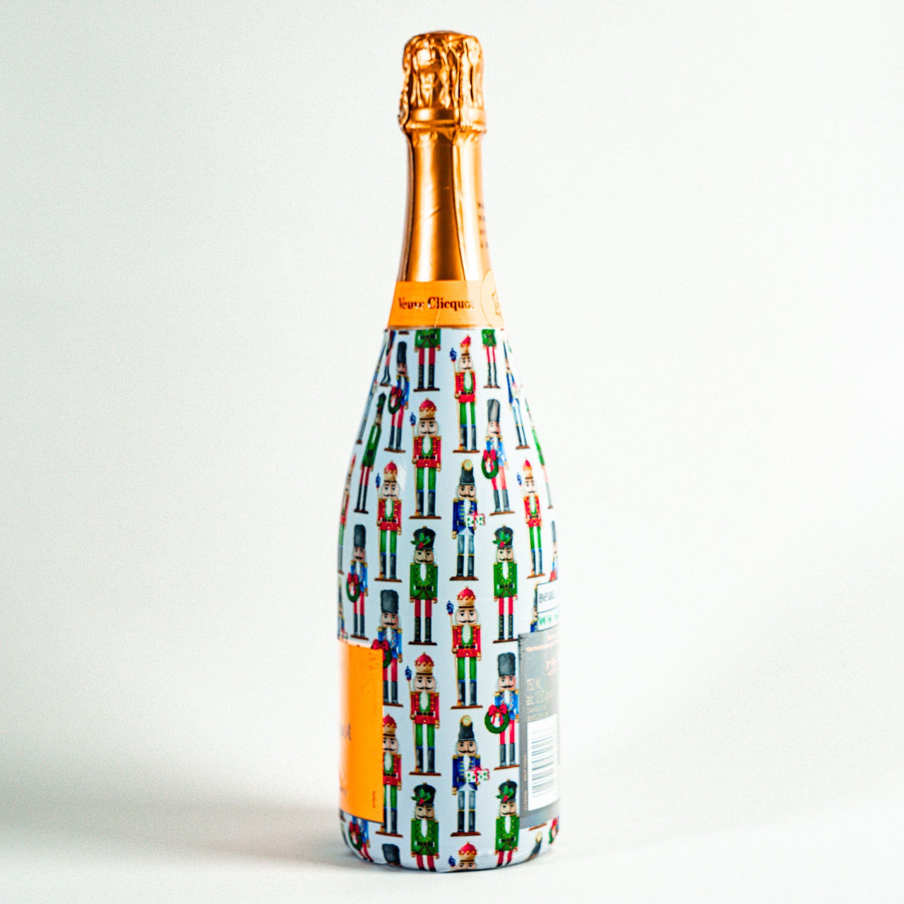 WH Hostess Nutcrackers Bottle Wrap on Champagne Bottle