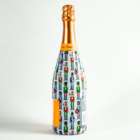 Thumbnail for WH Hostess Nutcrackers Bottle Wrap on Champagne Bottle