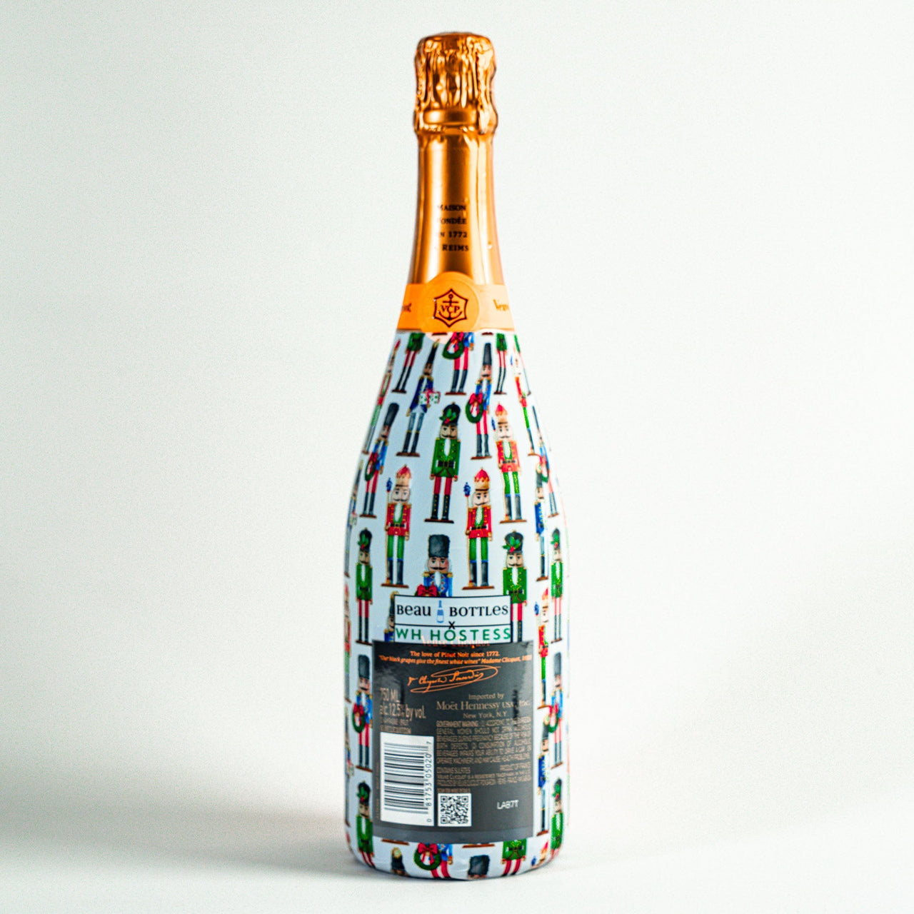 WH Hostess Nutcrackers Bottle Wrap on Champagne Bottle