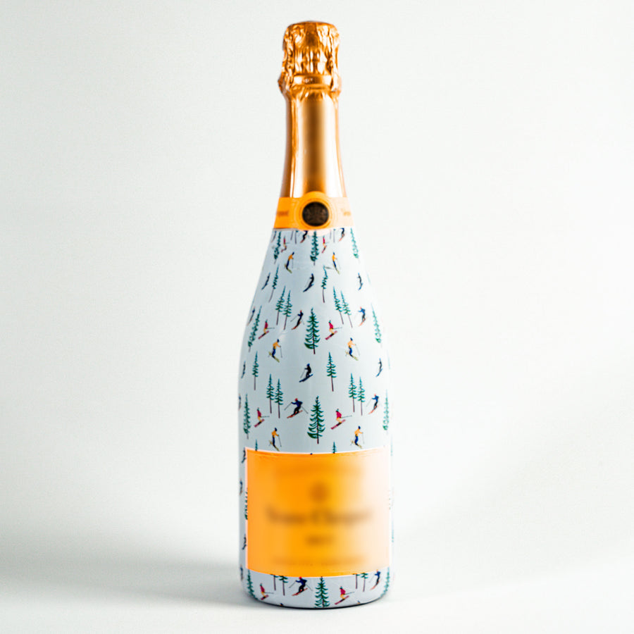 WH Hostess Ski Resort Bottle Wrap on Champagne Bottle