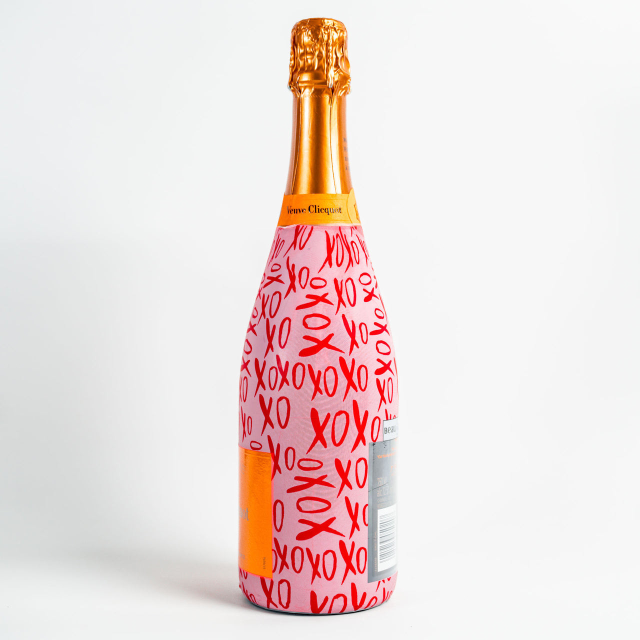Limited Edition XOXO Bottle Wrap on Champagne Bottle