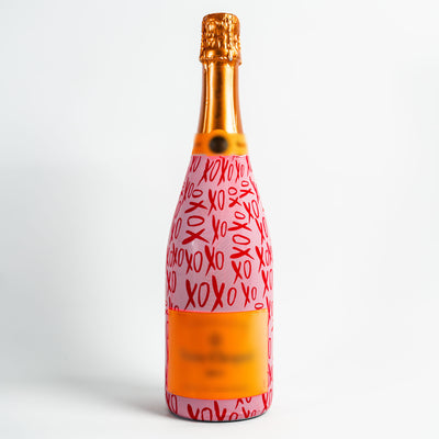 Limited Edition XOXO Bottle Wrap on Champagne Bottle