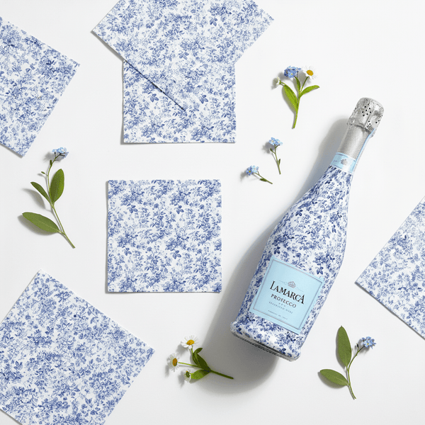 Blue Floral Napkins and Prosecco Flatlay